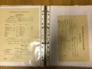 Pärm med aktiebrev, dokument, kvitton, program etc.  
