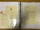 Pärm med aktiebrev, dokument, kvitton, program etc.  