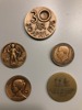 Fyra kungamedaljer i brons samt jubileumsmedalj ASEA